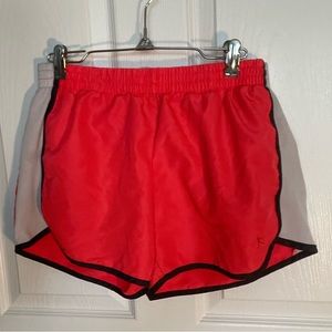 Pink and white athletic shorts